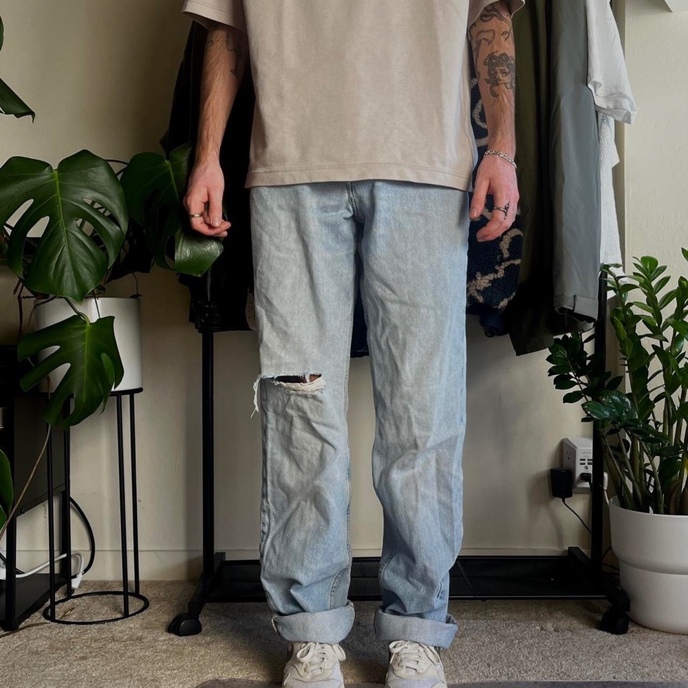 Eddie Bauer - Light wash blue jeans with a baggy, loose, normal fit.